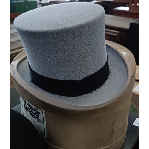 28 - A top hat with box, and two bowler hats (3)<br /><br />Please note collection is from TA9 4LJ only o...