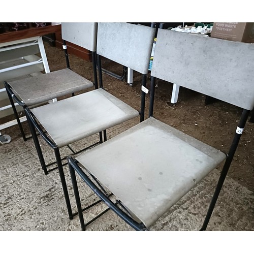 30 - A modern table, on metal supoorts, with trays, and three chairs (4)<br /><br />Please note collectio...