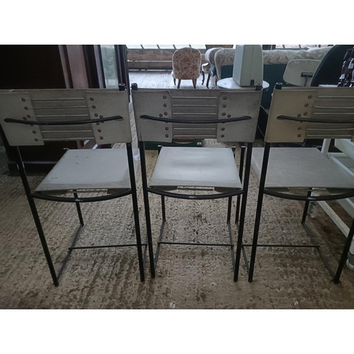 30 - A modern table, on metal supoorts, with trays, and three chairs (4)<br /><br />Please note collectio...