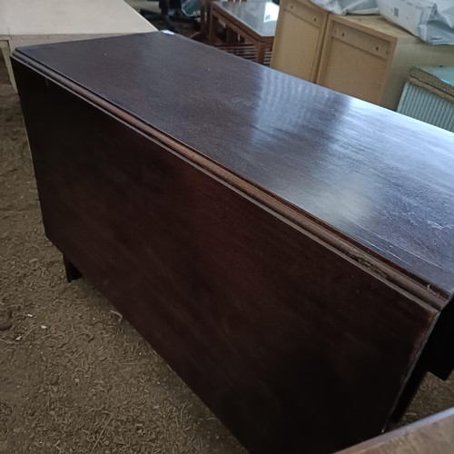 34 - A mahogany drop leaf table, 110 cm widePlease note collection is from TA9 4LJ only on 22nd, 23rd, 24... 