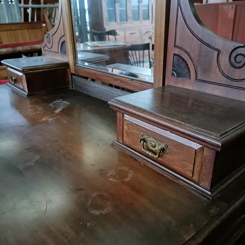 36 - An early 20th century mahogany dressing table, with two frieze drawers, 109 cm wide<br /><br />Pleas...