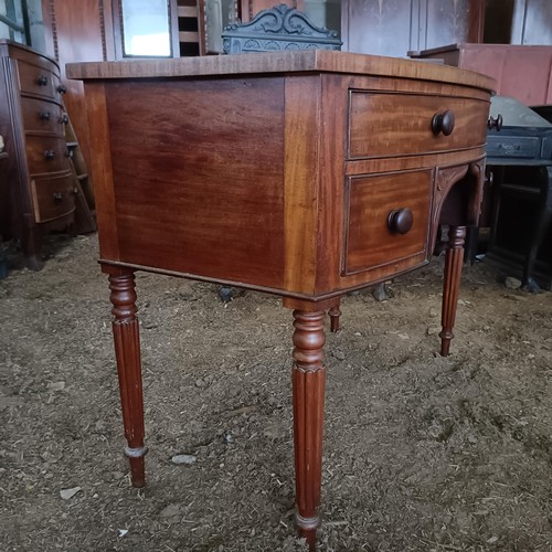 38 - A mahogany bow front sideboard, with three drawers, 104 cm wide<br /><br />Please note collection is...