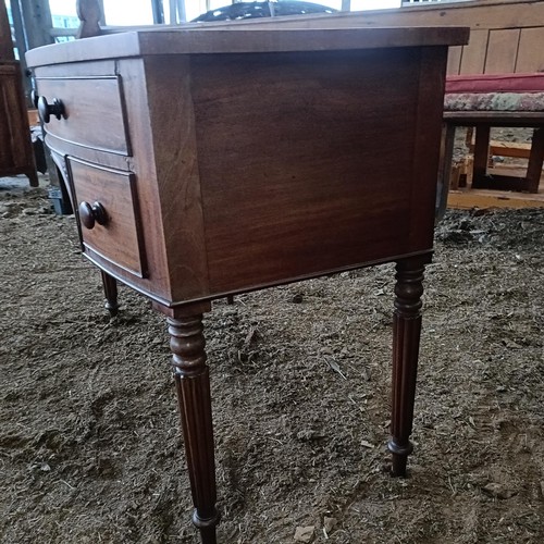 38 - A mahogany bow front sideboard, with three drawers, 104 cm wide<br /><br />Please note collection is...