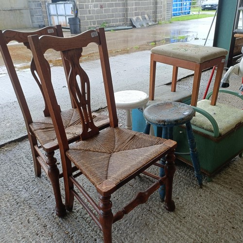 55 - A pair of oak single chairs, a pair of stools, a piano stool, a single stool, and a Lloyd Loom type ...