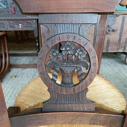 56 - A set of six French walnut chairs, with floral carved splat backs (6)<br /><br />Please note collect...