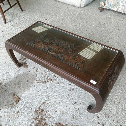 57 - A Chinese carved coffee table, 96 cm widePlease note collection is from TA9 4LJ only on 22nd, 23rd, ... 