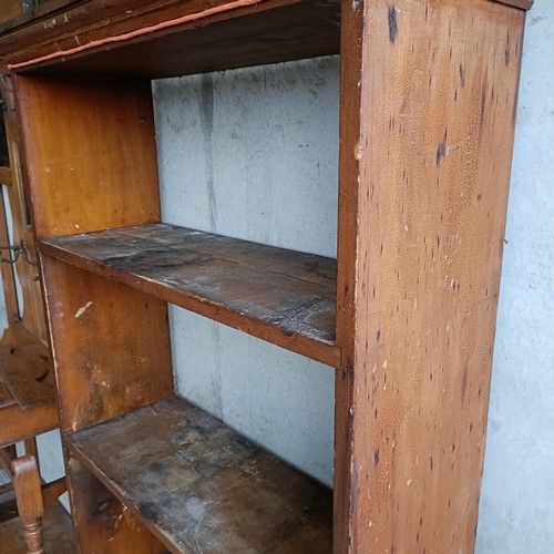 61 - A open bookcase, 83 cm wide, and another, 84 cm wide (2)Please note collection is from TA9 4LJ only ... 