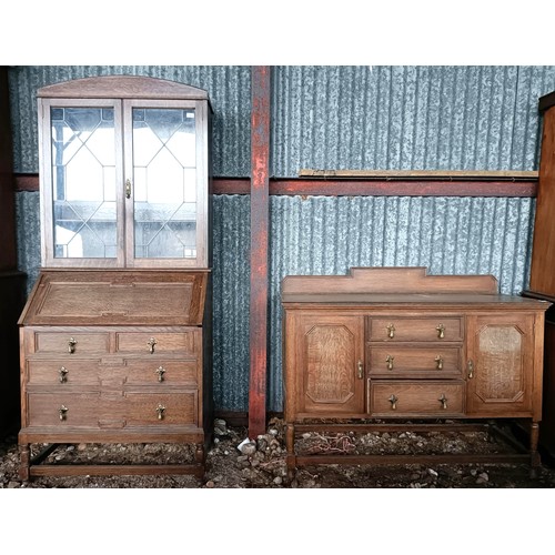 70 - An oak bureau bookcase, 82 cm wide, and a sideboardPlease note collection is from TA9 4LJ only on 22... 