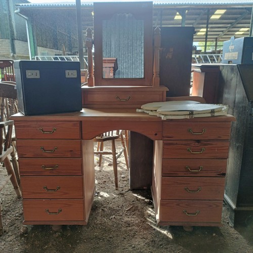 84 - A pine dressing chest, 124 cm wide, a Singer sewing machine and a tryptych mirrorPlease note collect... 