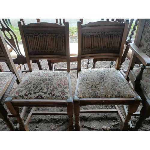 99 - A set of seven oak dining chairs, with carved linen fold backs (2+5)Please note collection is from T... 