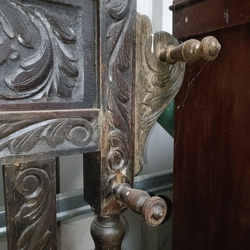 107 - A carved oak hallstand, 110 cm widePlease note collection is from TA9 4LJ only on 22nd, 23rd, 24th &... 