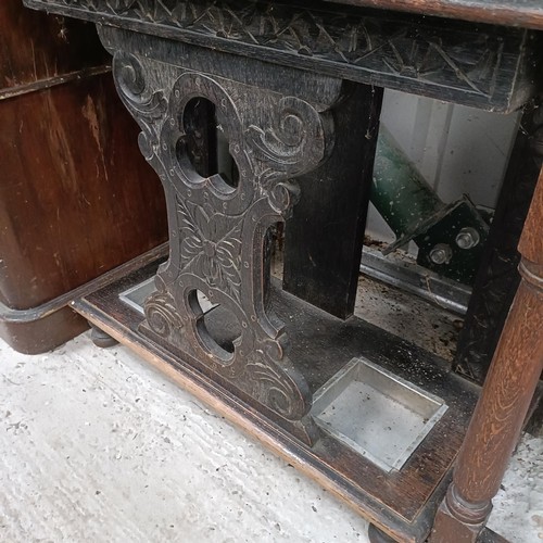 109 - A carved oak hallstand, 79 cm widePlease note collection is from TA9 4LJ only on 22nd, 23rd, 24th &a... 