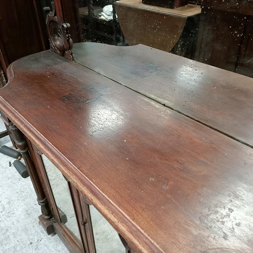 114 - A walnut credenza, with a raised mirrored back, 160 cm widePlease note collection is from TA9 4LJ on... 