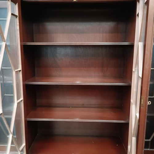 116 - A mahogany breakfront bookcase, 180 cm widePlease note collection is from TA9 4LJ only on 22nd, 23rd... 