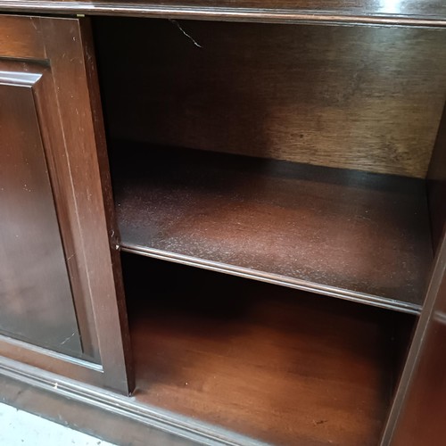 116 - A mahogany breakfront bookcase, 180 cm widePlease note collection is from TA9 4LJ only on 22nd, 23rd... 