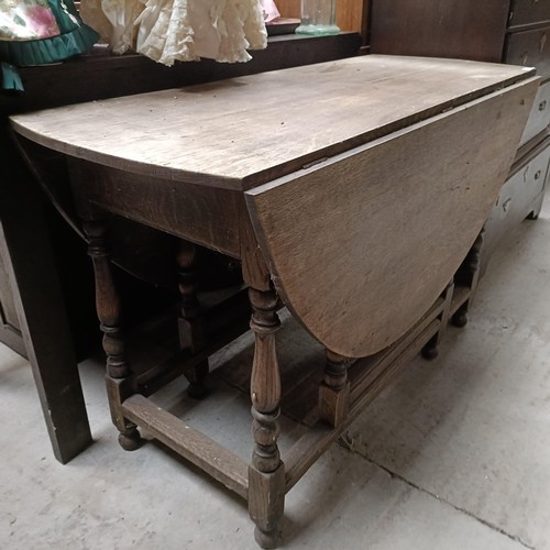 120 - An oak drop leaf table, 120 cm widePlease note collection is from TA9 4LJ only on 22nd, 23rd, 24th &... 