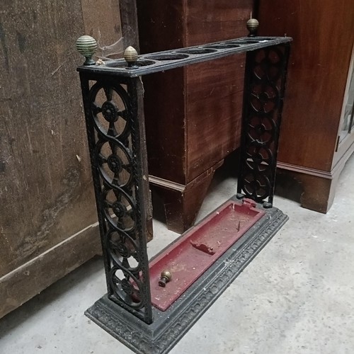 141 - An early 20th century cast iron stick stand, 65 cm widePlease note collection is from TA9 4LJ only o... 