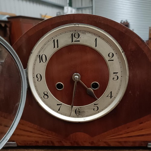 142 - A mahogany glazed bookcase, 97 cm wide, an Art Deco clock and two biscuit barrelsPlease note collect... 