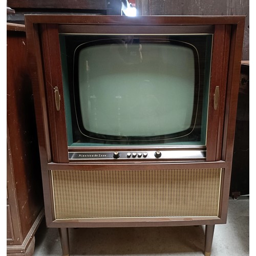 145 - A vintage Nineteenth De Luxe television, cased, 63 cm widePlease note collection is from TA9 4LJ onl... 