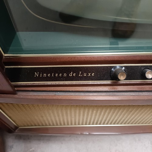 145 - A vintage Nineteenth De Luxe television, cased, 63 cm widePlease note collection is from TA9 4LJ onl... 