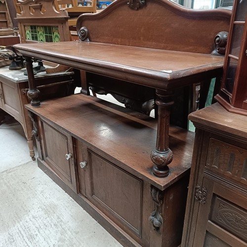 151 - A late 19th/early 20th century oak buffet, 142 cm widePlease note collection is from TA9 4LJ only on... 