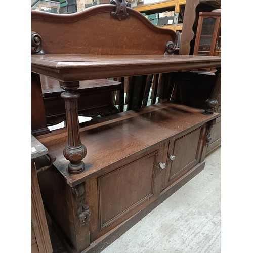 151 - A late 19th/early 20th century oak buffet, 142 cm widePlease note collection is from TA9 4LJ only on... 