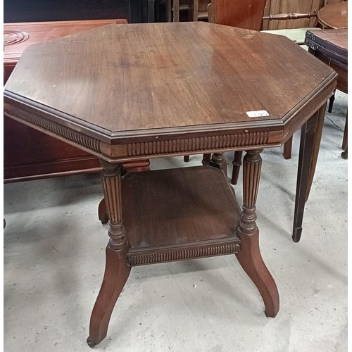 230 - A walnut lamp table, 72 cm wide, and a nest of three tables, 50 cm widePlease note collection is fro... 