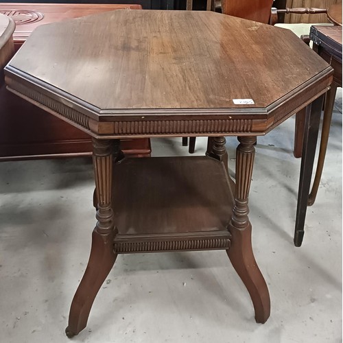 230 - A walnut lamp table, 72 cm wide, and a nest of three tables, 50 cm widePlease note collection is fro... 