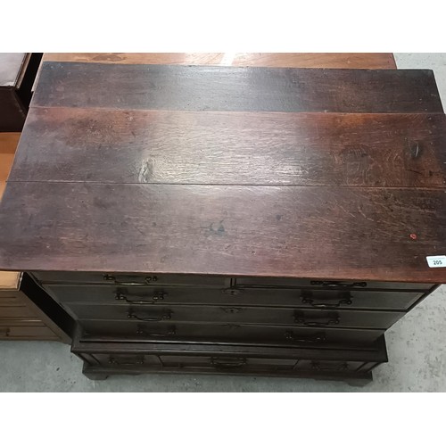 205 - A late 18th century oak and walnut crossbanded chest on stand, with two short and three long drawers... 