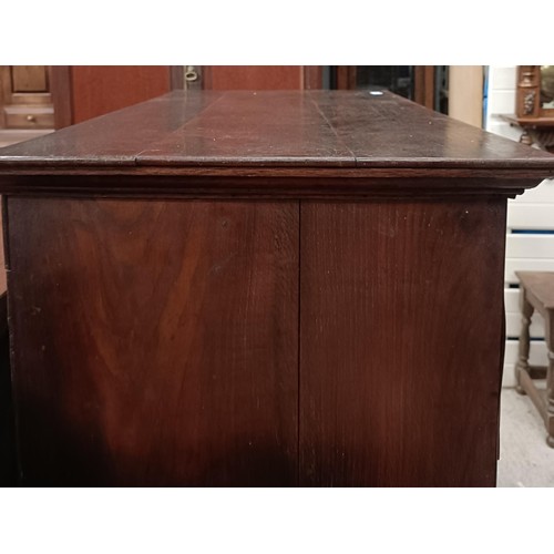 205 - A late 18th century oak and walnut crossbanded chest on stand, with two short and three long drawers... 