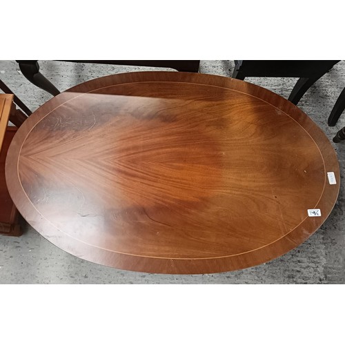 198 - A mahogany oval coffee table, and another (2)Please note collection is from TA9 4LJ only on 22nd, 23... 