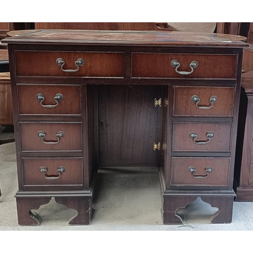 228 - A 20th century mahogany kneehole desk, 92 cm wide, and a TV standPlease note collection is from TA9 ... 