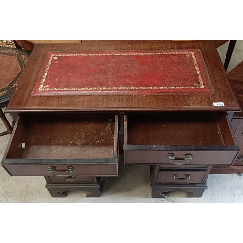 228 - A 20th century mahogany kneehole desk, 92 cm wide, and a TV standPlease note collection is from TA9 ... 