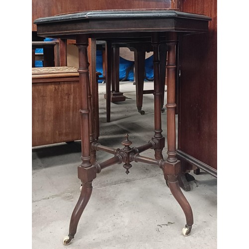 227 - A Victorian octagonal occassional table, with an inlaid top, on turned legs united by an X stretcher... 