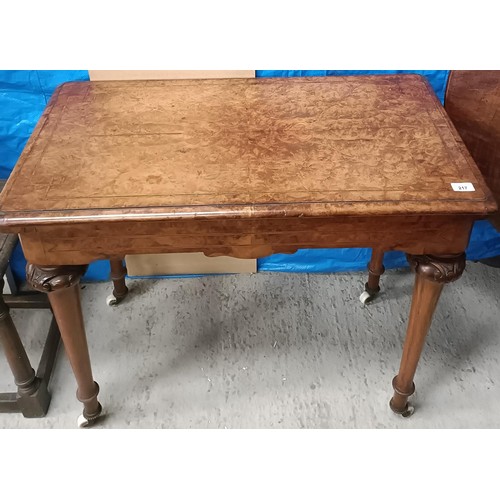 217 - A Victorian walnut folding card table, on turned tapering legs to castors, 90 cm widePlease note col... 