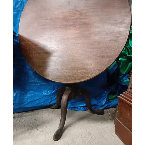 218 - A 19th century mahogany tilt top table, on a column support to a tripod base, 83 cm widePlease note ... 