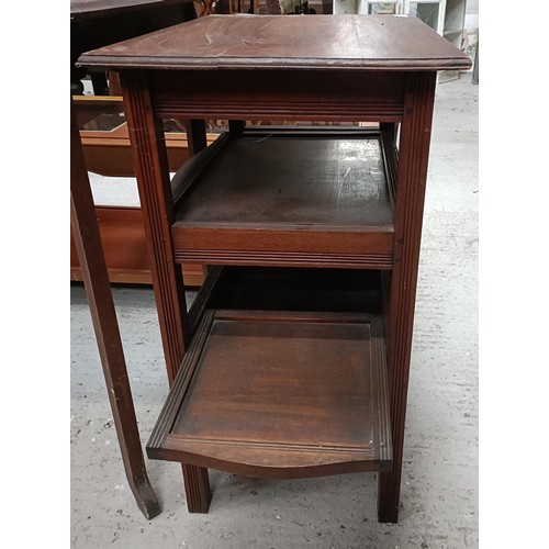 197 - An early 20th century carved oak table, 76 cm wide, and an early 20th century walnut three tier stan... 