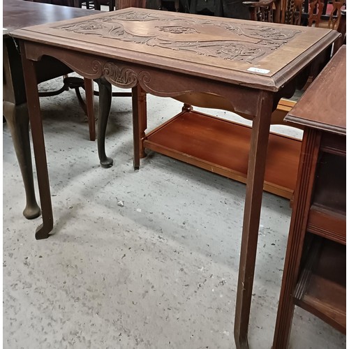 197 - An early 20th century carved oak table, 76 cm wide, and an early 20th century walnut three tier stan... 