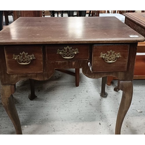 196 - A mahogany lowboy, having three drawers, 70 cm widePlease note collection is from TA9 4LJ only on 22... 