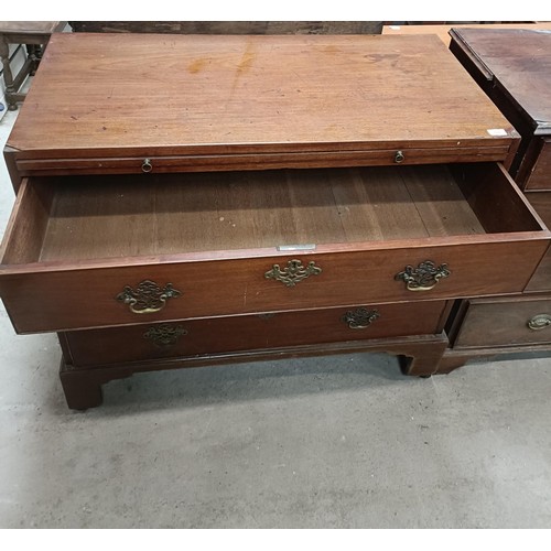 188 - A mahogany chest, with a brushing slide and three long drawers, 107 cm widePlease note collection is... 