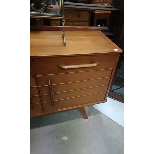 162 - A teak sideboard, with two drawers and two cupboard doors, matching table and four chairsPlease note... 