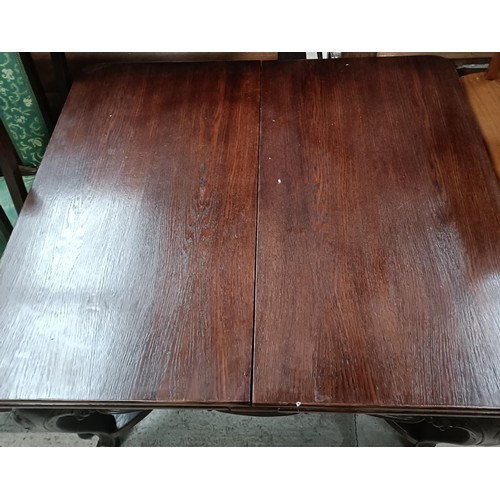 161 - An early 20th century French oak draw leaf dining table on carved cabriole legs, 125 cm x 103 cm, an... 