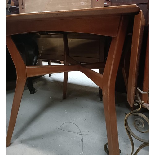 162 - A teak sideboard, with two drawers and two cupboard doors, matching table and four chairsPlease note... 