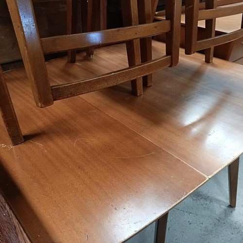 162 - A teak sideboard, with two drawers and two cupboard doors, matching table and four chairsPlease note... 