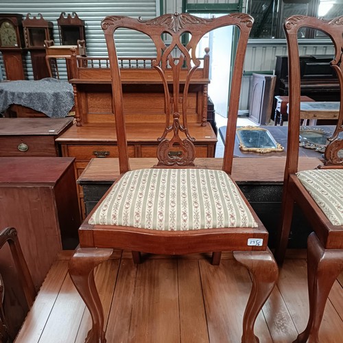 175 - A set of four mahogany Chippendale style dining chairs, with a matching draw leaf table, 150 cm wide... 