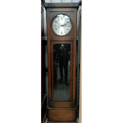 208 - A 1920's longcase clock, in an oak case, 195 cm highPlease note collection is from TA9 4LJ only on 2... 