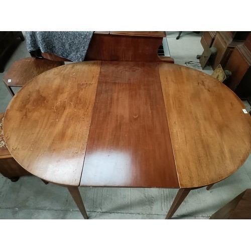 223 - A mahogany D end dining table, with an extra leaf, extended 165 x 105 cmPlease note collection is fr... 