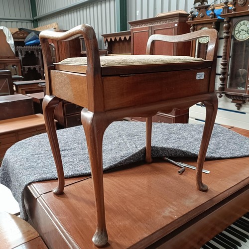 224 - A walnut piano stoolPlease note collection is from TA9 4LJ only on 22nd, 23rd, 24th & 25th Octob... 