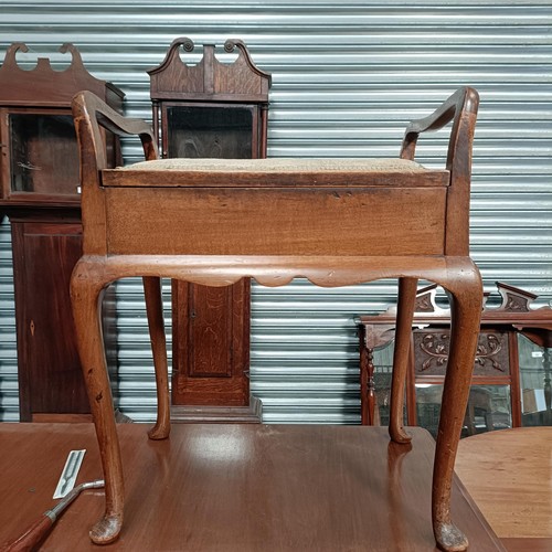 224 - A walnut piano stoolPlease note collection is from TA9 4LJ only on 22nd, 23rd, 24th & 25th Octob... 