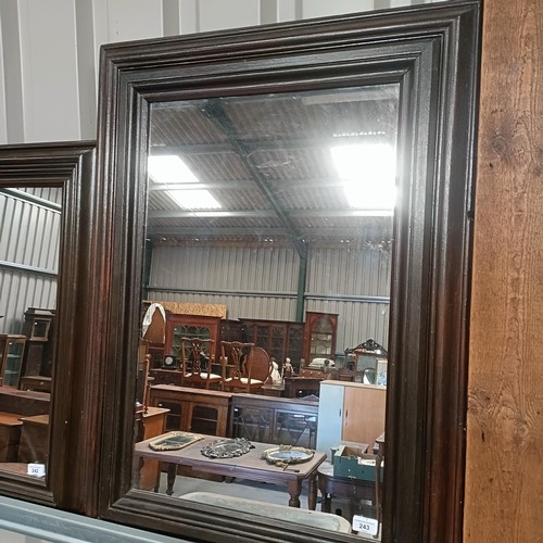 243 - A walnut wall mirror, 90 x 60 cmPlease note collection is from TA9 4LJ only on 22nd, 23rd, 24th &... 